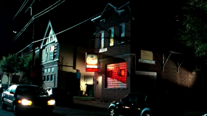 Annie and Rhodes go to a bar – exterior