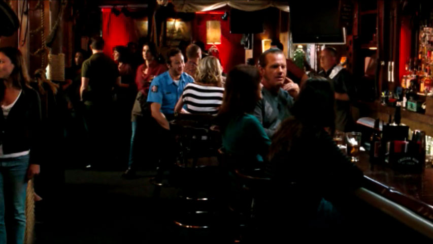 Annie and Rhodes go to a bar – interior